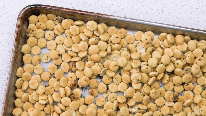 A Baking Sheet Filled with Golden-Brown Ranch-Seasoned Oyster Crackers